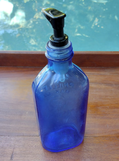 Vintage blue Phillips Milk of Magnesia bottle